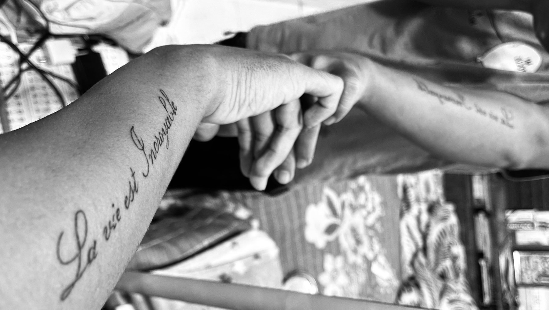 Friends joining hands together