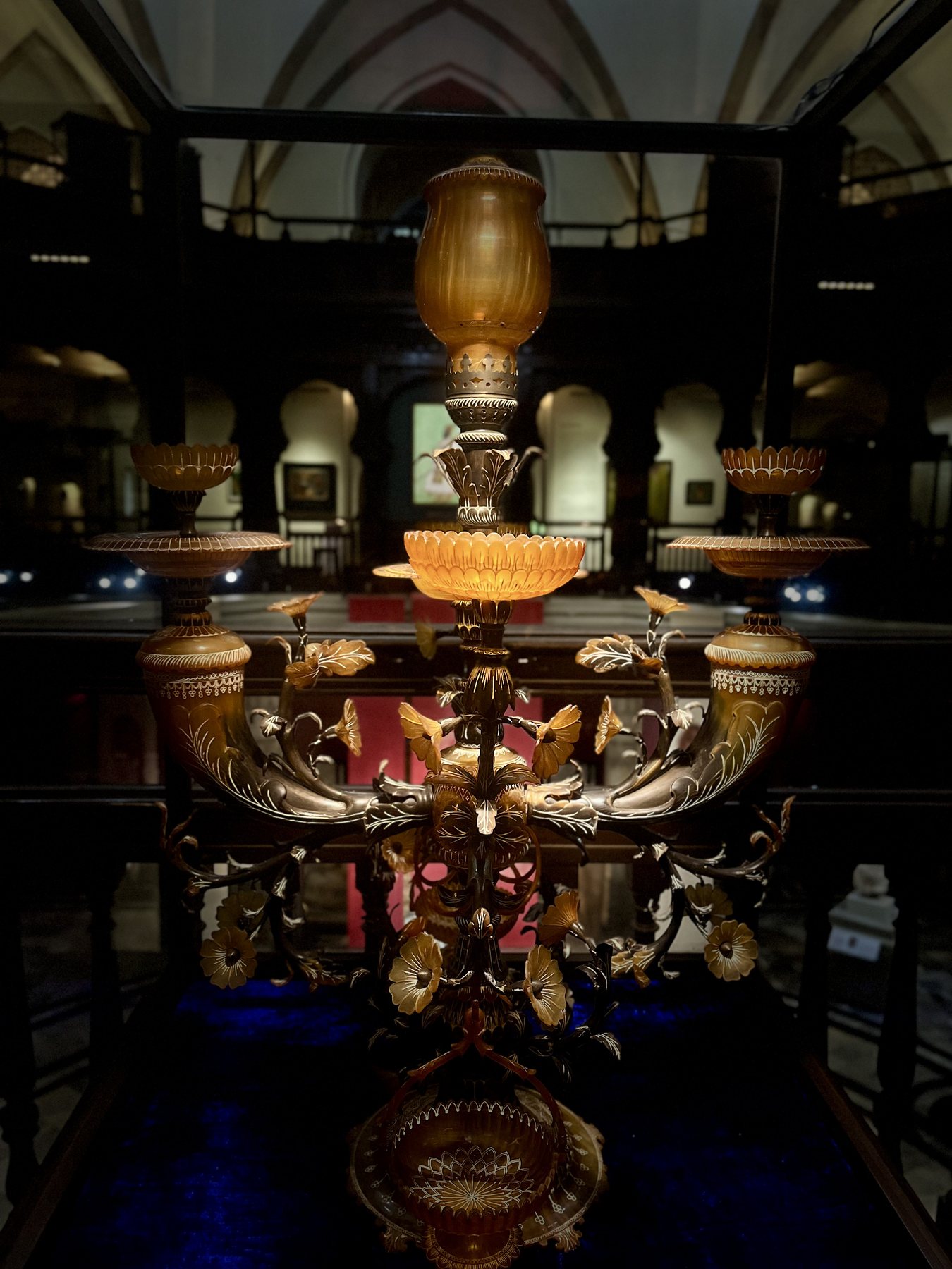 Warm lights and reflections in an ornate interior